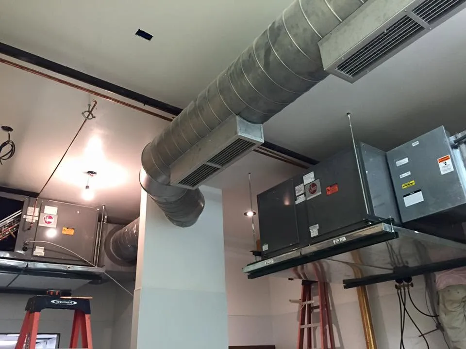 Air handlers and exposed ductwork in an active installation